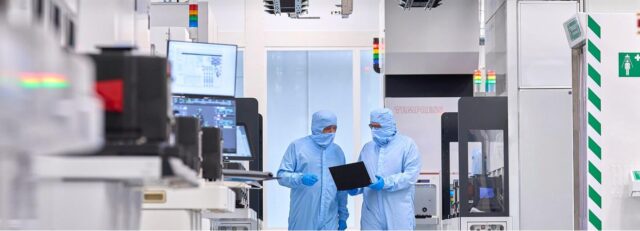 Two lab workers