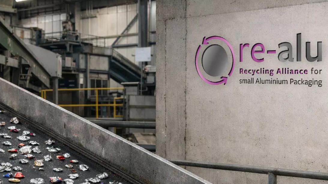 Logo of re-alu in front of a recycling line