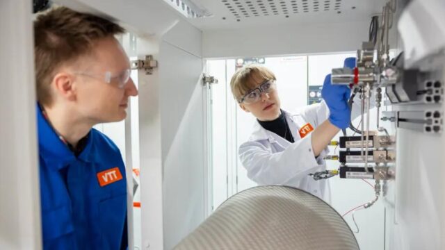 Two VTT lab workers